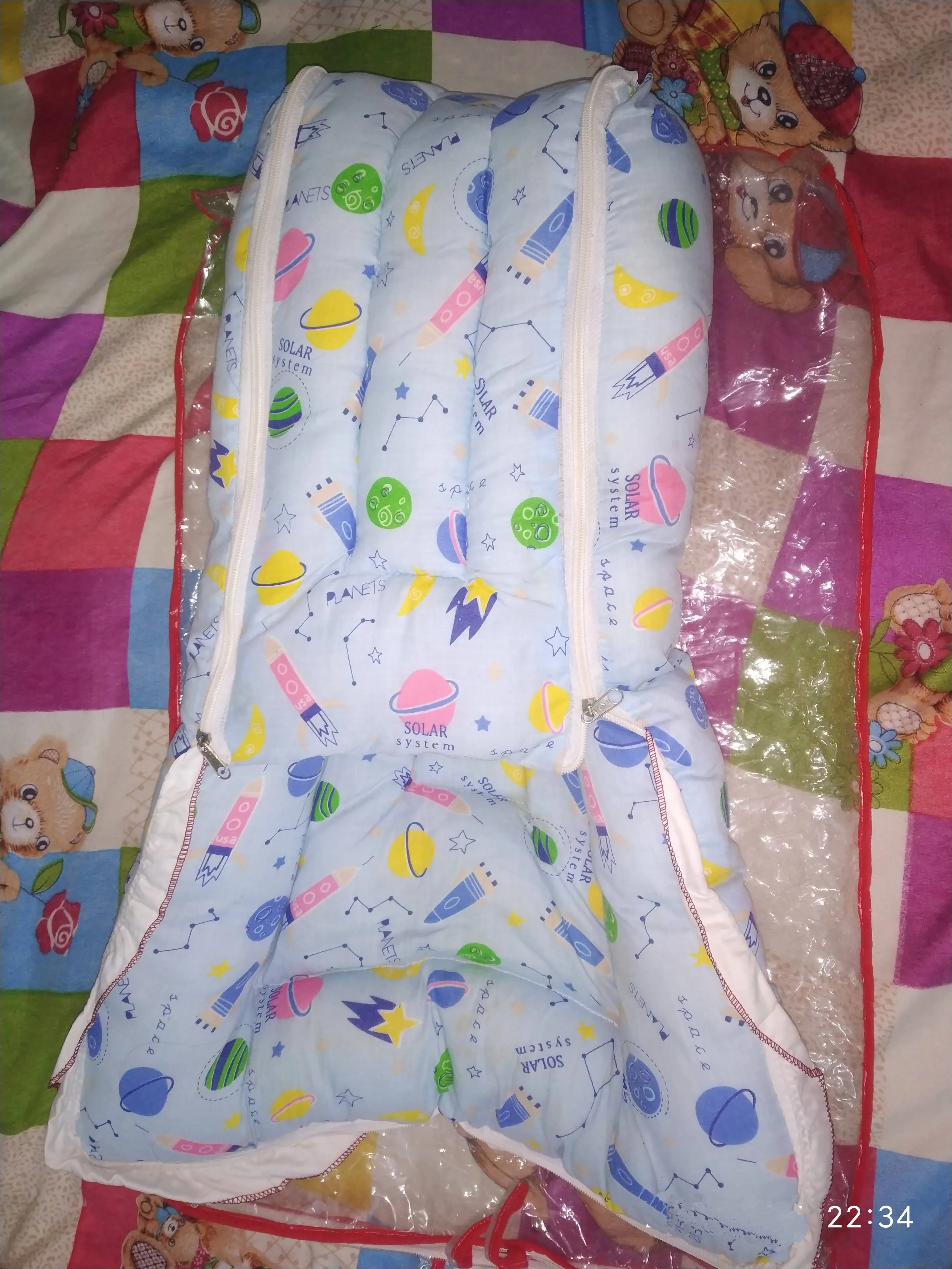 Baby carrier nest cum bed cushion